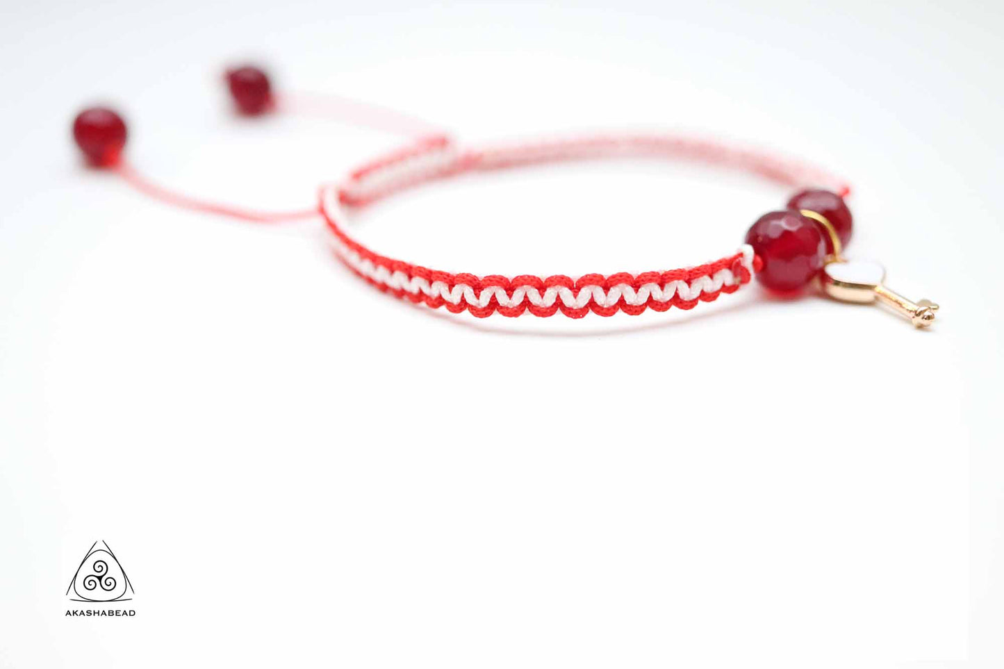 Adjustable braided red ruby with lock and key charm | anti negative energy