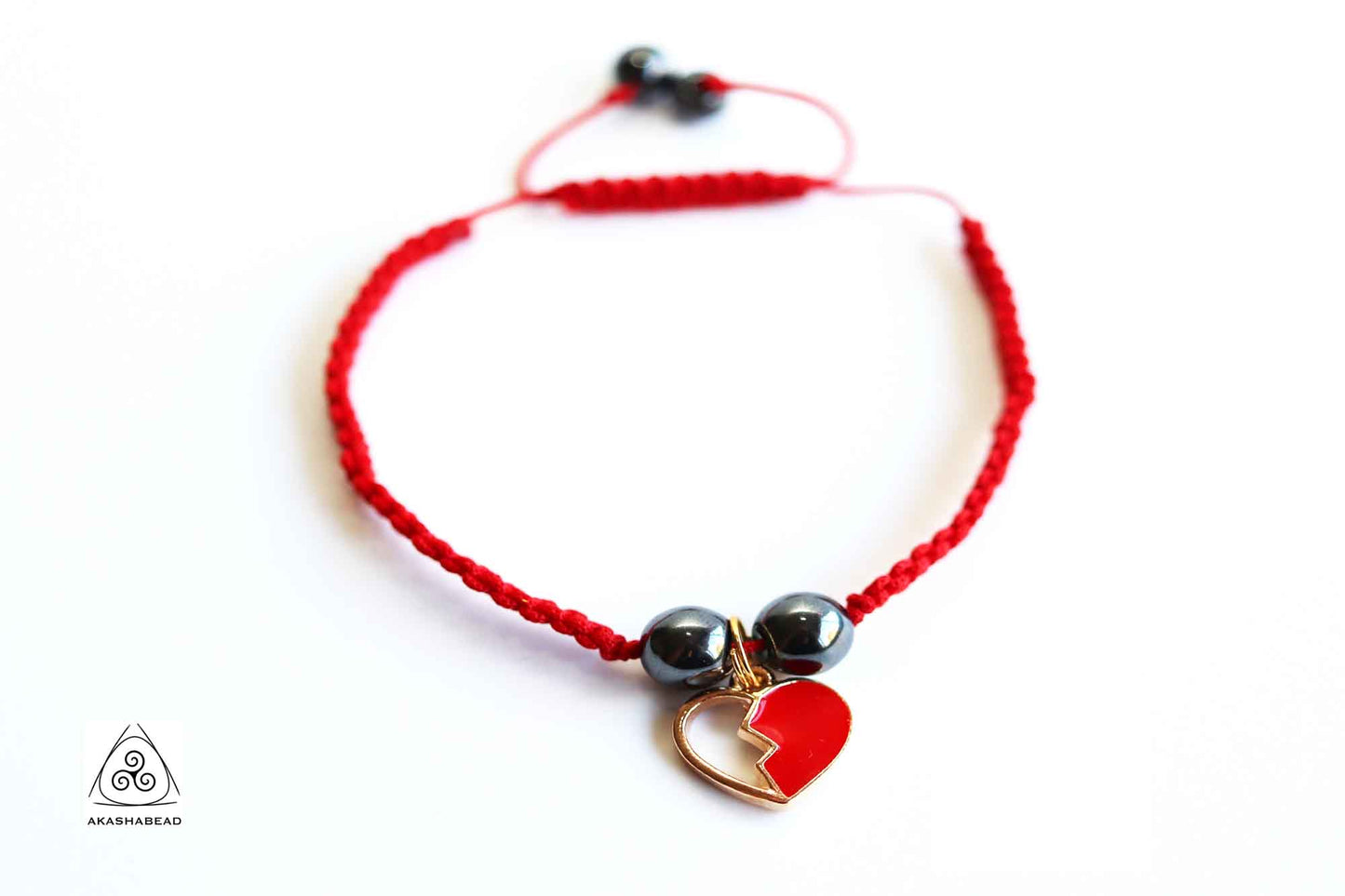 Adjustable Hematite Braided bracelet with heart charm | positive energy