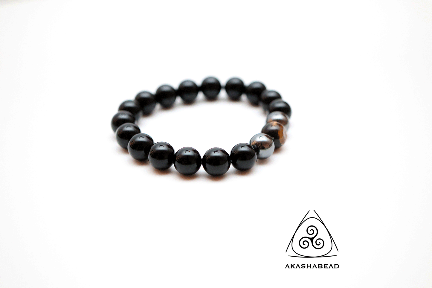 Self-confidence with Onyx, Hematite and tiger eye to balance energy | 12 mm beads